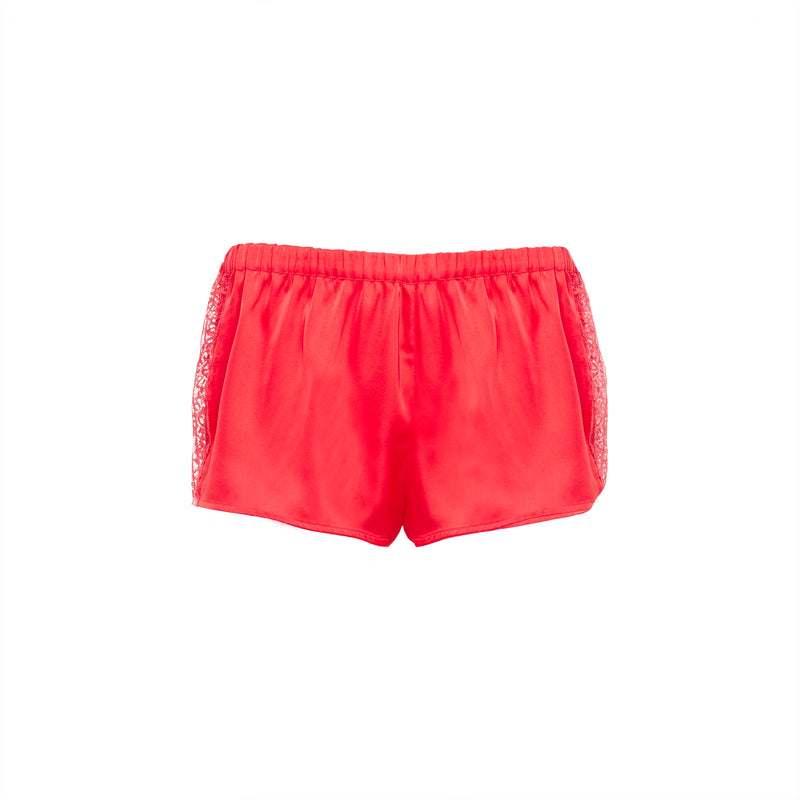 red shorts with lace trim on a white background