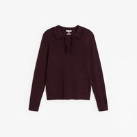 A dark plum long-sleeve knit top with a ruffled collar and a small ruffle detail at the placket, shown flat on a light gray background.