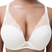 White lace underwire bra with wide shoulder straps and scalloped edges, shown on a model against a plain white background.
