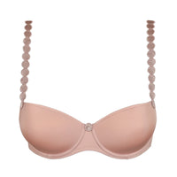 Pink bra with beaded straps on a white background
