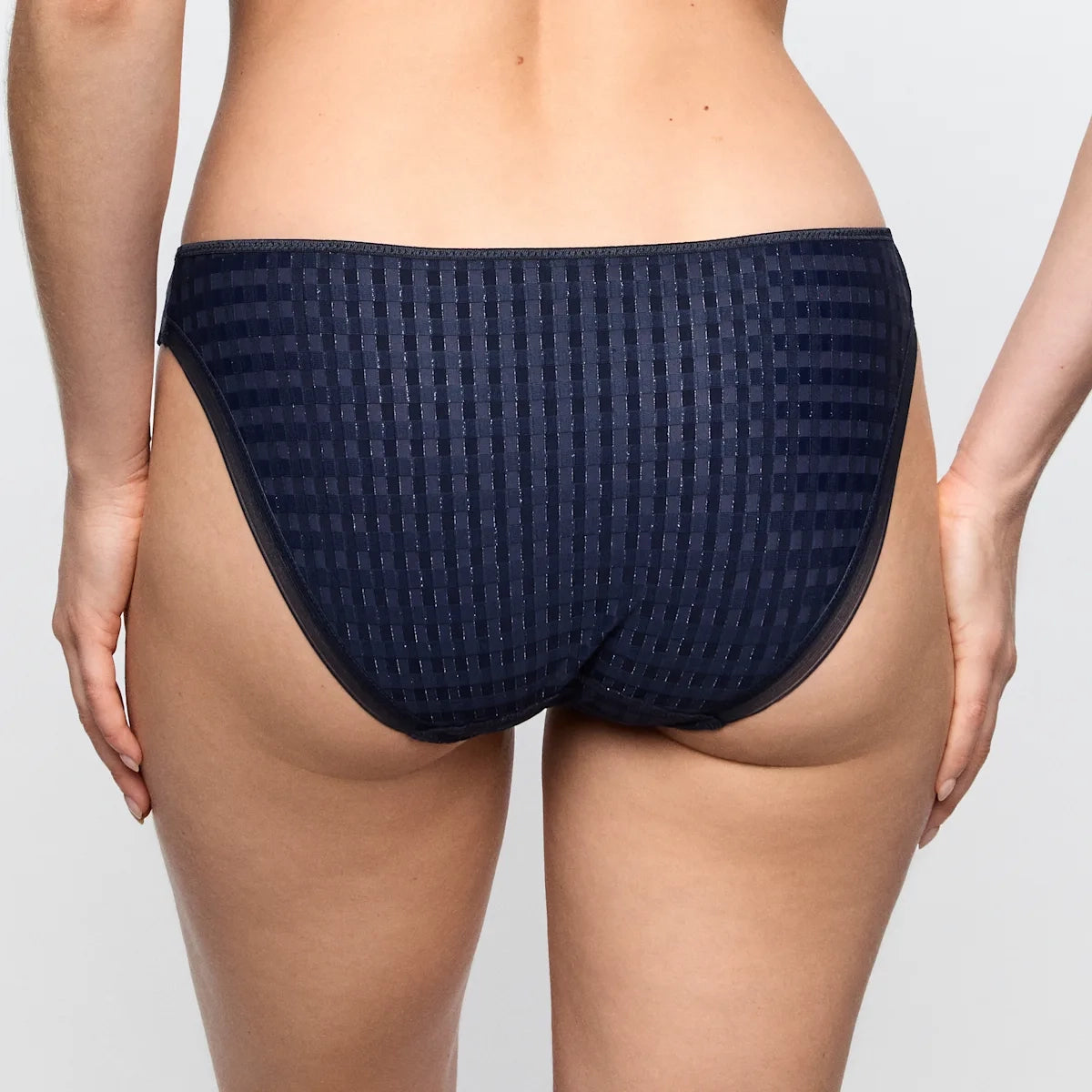Navy blue textured underwear on a plain background