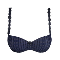 Navy blue bra with intricate detailing on a white background