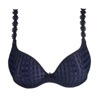 Navy blue patterned bra with decorative straps on a white background
