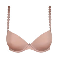 A light pink seamless underwire bra with decorative circular lace trim along the straps and a matching lace center button, shown on a plain white background.
