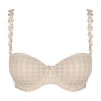 beige bra with floral lace details on a white background
