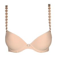 beige bra with decorative straps on a white background