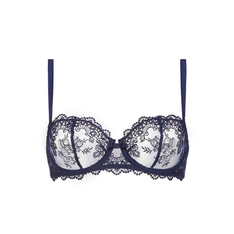 A navy blue lace underwire bra with sheer mesh cups, displayed against a solid white background.