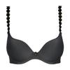 black bra with decorative straps on a white background